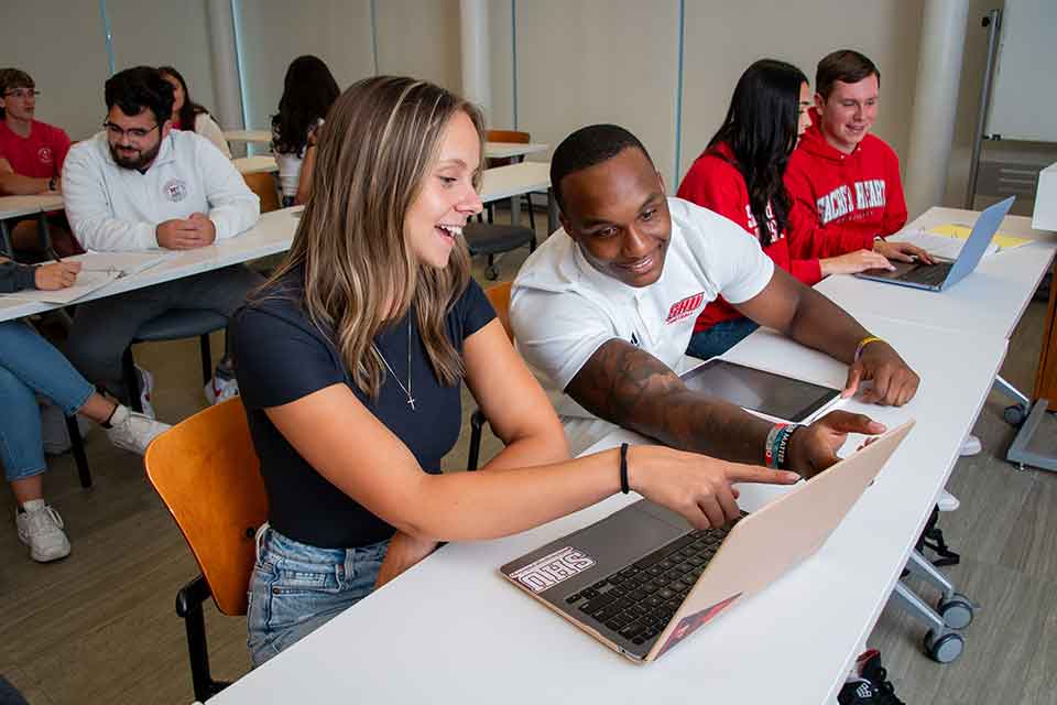 Students collaborate in one of SHU's classrooms at the Martire Center for the Liberal Arts